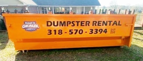 Dump 'N Geaux Business Logo on the side of a Dumpster