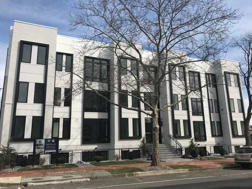 White building with black windows