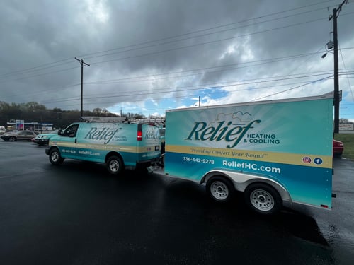 Relief Heating & Cooling work van with trailor