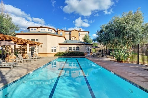 Sparkling Swimming Pool with Sundeck at Renaissance Apartment Homes