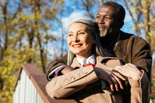 couple hugging on a trail