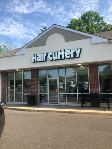 The front entrance of Hair Cuttery at Crossroads Plaza.