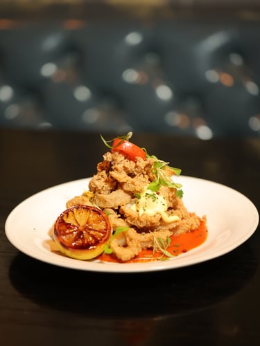 Fried calamari at Parker and Quinn with a lemon wedge.