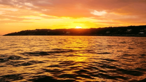 sunset over a body of water