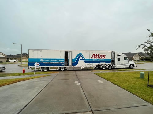 A Walker Transfer-Powell truck outside a customer's home.