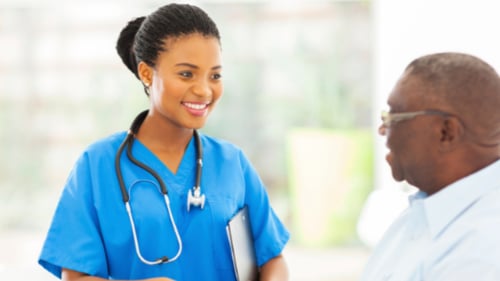 Medical professional talking to patient