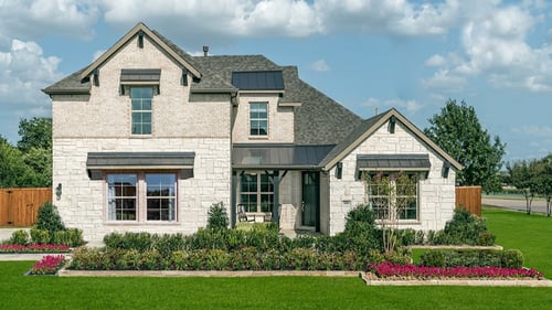 two-story home exterior with covered front door