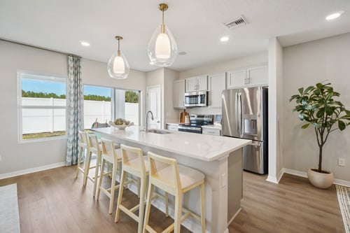 The Kitchen of a DRB Homes Leila Model at Twin Oaks in the Villages of Pasadena Hills, FL.