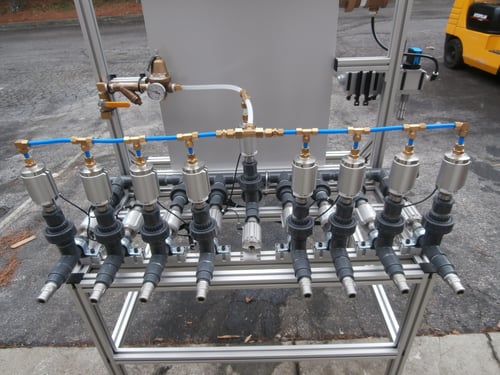 Pneumatic machine assembly mounted on t-slot aluminum frame