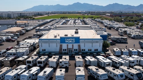 camping world avondale az storefront with rvs and mountain in the background