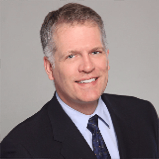 Headshot of Travis J. Schultz