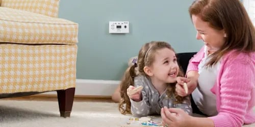 mother-daughter-carbon-monoxide-detector