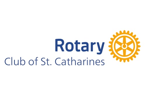 Logo of the Rotary Club of St. Catharines with text in blue on a black background. A yellow rotary gear emblem is on the right, symbolizing service.