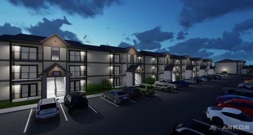 Compass Flats modern two-story apartment and parking lot