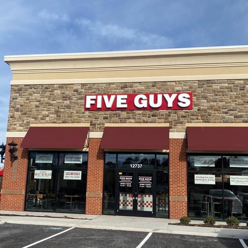 Exterior photograph of the Five Guys restaurant at 12737 Stone Village Way in Midlothian Virginia.