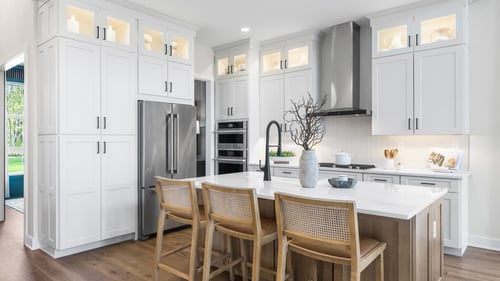 Kitchen boasts a large center island and stainless steel appliances