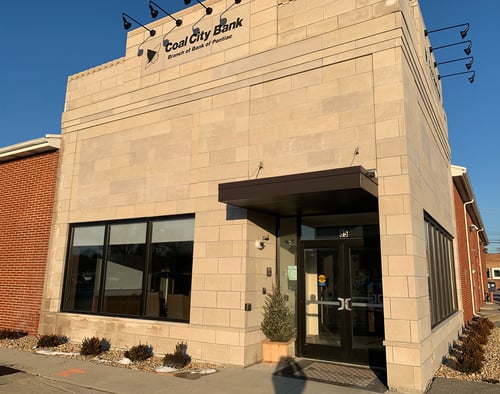 The front view of the brick building where Bank of Pontiac's Coal City branch is located in.
