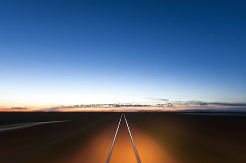 An empty road at dusk.