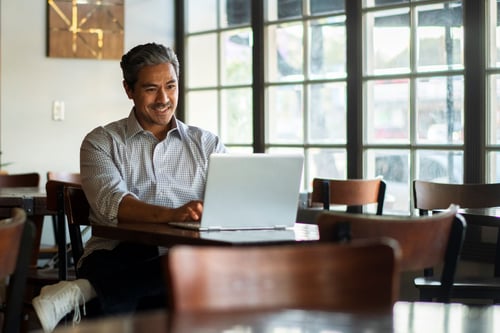 a person doing remote work using Wi-Fi at a restaurant