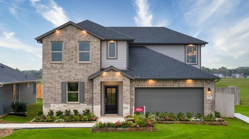 two-story family home with stone exterior