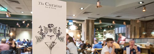 Menu and interior of The Curator