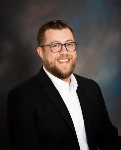 State Farm Agent Jeff Markworth in a black blazer and white dress shirt