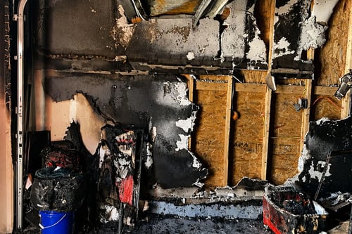 Fire damage is visible in a garage in Myrtle Beach