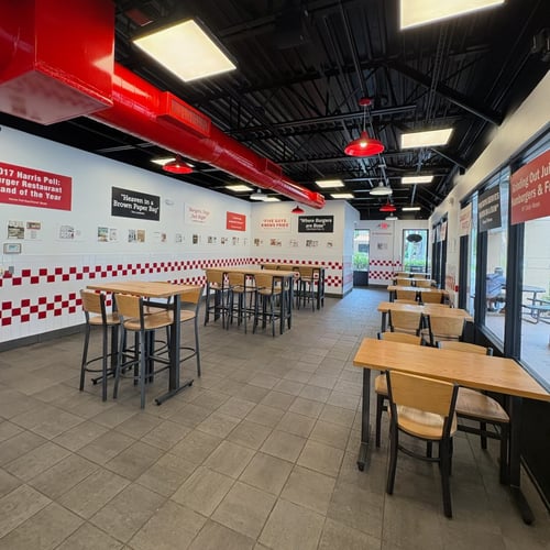 Photograph of the dining room of the Five Guys restaurant at 2240 NW 19th Street in Boca Raton Florida.