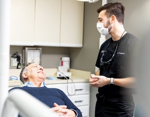 Whole Dental Wellness staff with patient