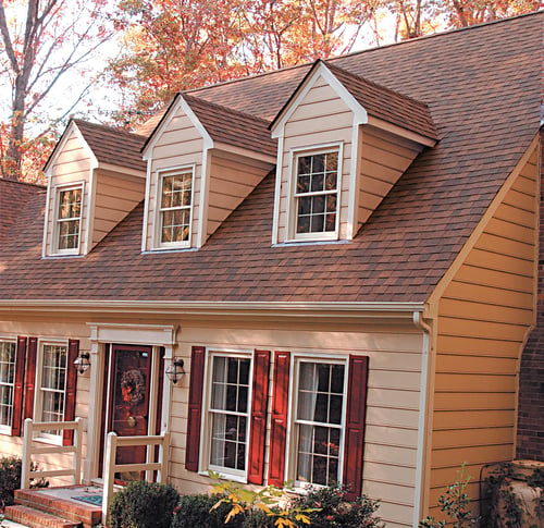 Two story home with dormers and new roof installed by Daugherty Roofing 814.