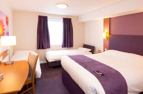 Premier Inn room with double bed and 2 single beds