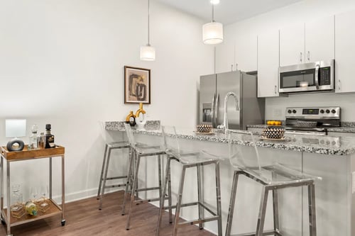 Kitchen at The Lumos Apartments in Cleveland, OH, 44106