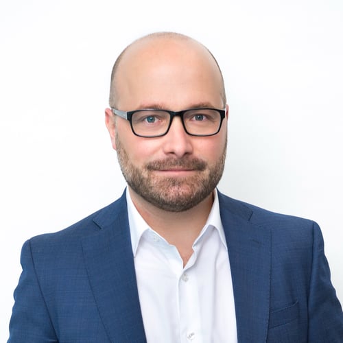 Headshot of Jean-Pierre Grenier