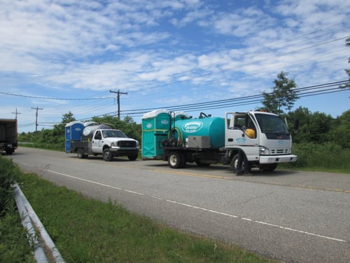 North Coast Sanitation Trucks delivering portable toilets and sinks in the Erie, PA area.