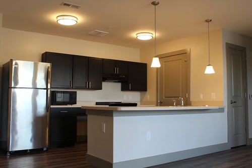 Kitchen with Stainless Steel Appliances and Eat-In Kitchen at Gladstone Apartments in Columbus, IN 47201
