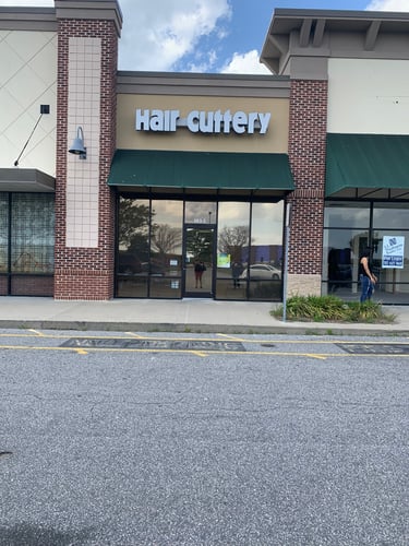 The front entrance of Hair Cuttery at Shoppes at Tanglewood.