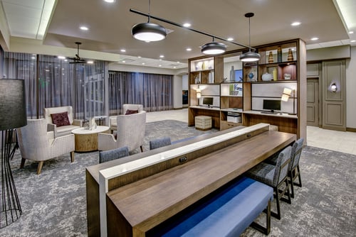 Enjoy plenty of seating and workspace in our spacious lobby.