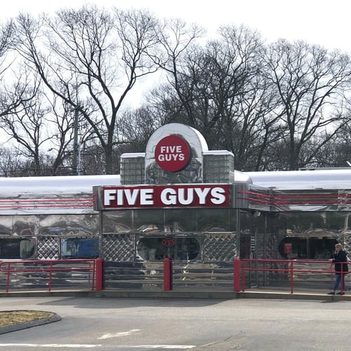 Exterior photograph of the Five Guys restaurant at 143 Gold Star Highway in Groton Connecticut.
