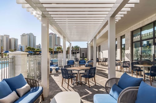 Outdoor seating near Salt & Sips in Orange Beach