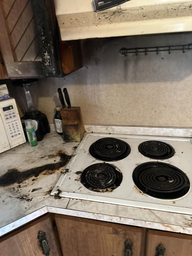 A damaged stove and countertop after a fire in a residential property in Mt. Pocono