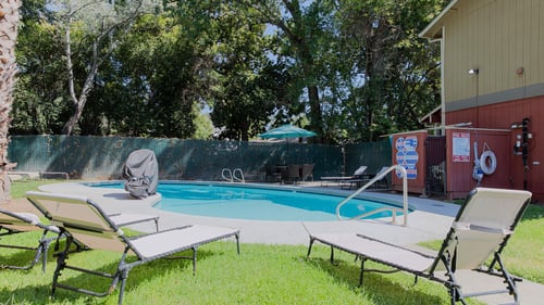 Poolside Relaxing Chairs at Pomona Townhomes, Chico, California