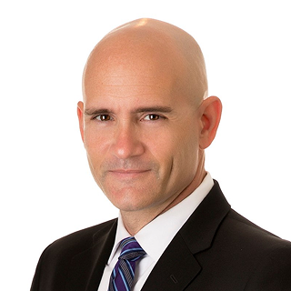 Headshot of Dennis Spika