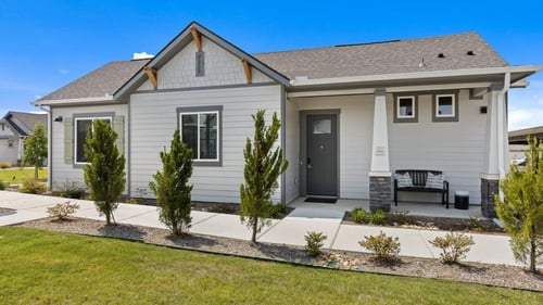 Single family detached home exterior at Avilla Traditions in Grand Prairie, TX
