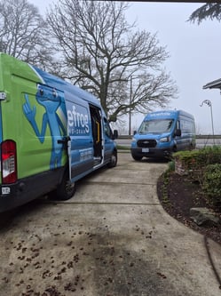bluefrog portland vans at a work site