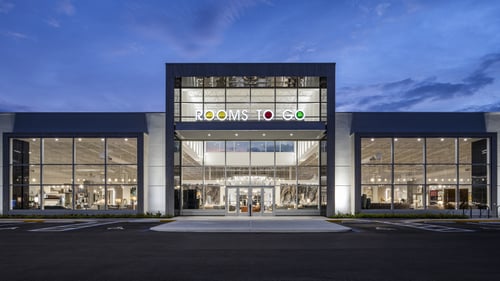 modern storefront of furniture rooms to go located in naples, florida.