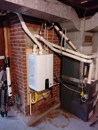 a new tankless water heater in a Northeast Portland basement