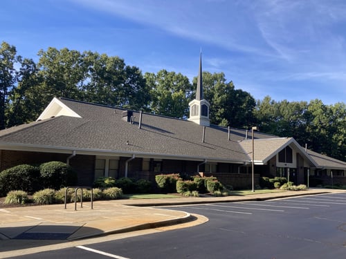 christian church building and parking lot