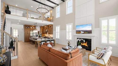 Two-story great room boasts a gas fireplace