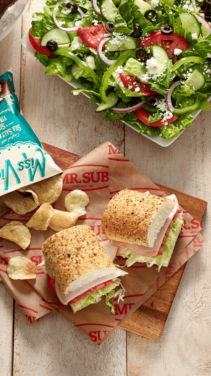 Mr. Sub catering platter featuring a small sub, side of chips, and salad to share. 