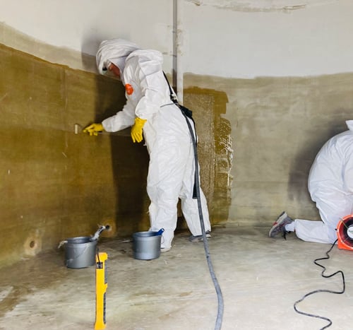 norwoods fiberglass tank repair technician sealing a fuel tank